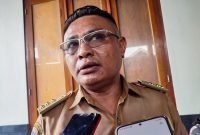 Dedy Paukoma, Kepala Distrik Mimika Baru.