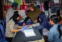 Suasana kegiatan pengobatan gratis oleh Dinas Kesehatan Mimika di Pos Peka, lokasi eks Pasar Swadaya, Jalan Yos Sudarso, Rabu (2/11/2022). 