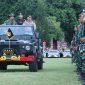 Kapolri, Jenderal Polisi Listyo Sigit Prabowo bersama Panglima TNI, Jenderal TNI Muhammad Andika Perkasa memeriksa pasukan saat apel gelar pasukan Operasi Puri Agung 2022 di Lapangan Puputan Margerana, Denpasar, Senin (7/11/2022). 