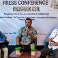 Ketua Panitia Natal Bersama BUMN Regional Timika, Rony Yawan, sedang menjelaskan perihal rangkaian kegiatan dalam press conference yang berlangsung di Rumah Kopi Amungme Gold, Jl. Malcon, Timika, Papua Tengah, Selasa (27/12/2022). 