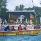 Sejumlah perahu mengangkut jemaat saat hendak berlabuh di Pulau Mansinam, Distrik Manokwari Timur, Kabupaten Manokwari, Minggu (5/2/2023).