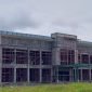 Gedung Kantor Polsek Bandara Mozes Kilangin, Timika, Papua Tengah, yang sedang dalam proses pembangunan. (Foto: Galeri Papua/Jefri Manehat)