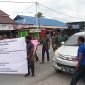 Masyarakat menggelar aksi di depan Kantor KPU Provinsi Papua Tengah, Jumat (27/10/2023). (Foto: Istimewa)