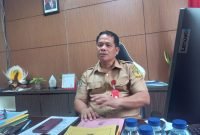 Kepala Badan Kesbangpol Kabupaten Mimika, Yan Selamat Purba. (Foto: Galeri Papua/Jefri Manehat)