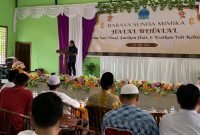 Pj Ketua Baraya Sunda Mimika, Ouceu Satyadipura, tengah membawakan sambutannya pada acara Halal Bi Halal Baraya Sunda Mimika di Aula Fii Dzalika, Jalan Poros Sp2-Sp5, Mimika, Papua Tengah, Minggu (5/5/2024). (Foto: Galeri Papua/Moh. Wahyu Welerubun)
