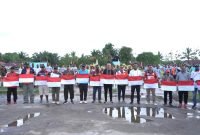 Gerakan nasional menyonsong HUT ke-79 RI, pembagian 10 juta bendera merah putih, di Kabupaten Mappi, Papua Selatan. (Foto: Istimewa/Humas Pemkab Mappi)