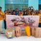 Foto bersama Tifa Creative dan pengelola Panti Asuhan Yapeda serta anak-anak panti. (Foto: Galeri Papua/Endy Langoebelen)