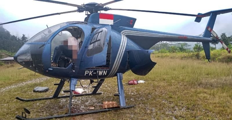 Tampak helikopter dan jenazah pilot Selandia Baru, Glen Malcolm Conning. (Foto: Istimewa)