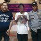 Polisi ringkus seorang pemuda yang membawa ganja di Pelabuhan Laut Jayapura, Jumat (23/8/2024). (Foto: Istimewa/Humas Polda Papua)