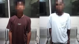 Dua tersangka kasus pembunuhan di Timika ditangkap polisi di lokasi pendulangan. (Foto: Istimewa/Humas Polsek Mimika Baru)