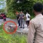 Aparat gabungan Polres Yahukimo dan Satgas Tindak ODC 2025 menemukan korban bersimbah darah di pinggir jalan dalam keadaan meninggal dunia. (Foto: Istimewa/Polres Yahukimo)