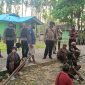 Pihak kepolisian sedang melakukan pengamanan guna menengahi permasalahan yang sedang terjadi di Distrik Kwamki Narama. (Foto: Polsek Kwamki Narama)