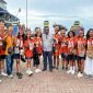 Foto bersama rombongan Tifa Creative dengan pihak Dinas Pariwisata Kabupaten Maluku Tenggara di Pelabuhan Tual. (Foto: Galeri Papua/Endy Langobelen)