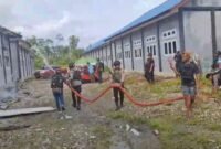 Respon Cepat, Tim Tindak Yahukimo Amankan Lokasi Kebakaran di SMA Negeri 2 Dekai, Sabtu 14 Februari 2026. (Foto: Istimewa/Satgas ODC 2026)