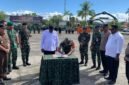 Penandatanganan berita acara kerja sama Pemkab Mimika dan Kodim 1710/Mimika dalam rangka akselerasi TMMD ke-128. (Foto: Galeri Papua/Ahmad)