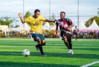 SMA Taruna Dharma kontra SMA Shining Stars pada babak penyisihan Kapolda Cup II Mini Soccer 2026 tingkat SMA se-Kabupaten Mimika, di Goldstone Arena Mini Soccer, Timika, Rabu (13/5/2026) sore. (Foto: Istimewa/Fernando Rio)