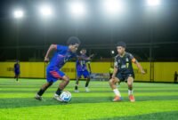 SMA Negeri 7 menghadapi SMK Negeri 1 pada babak penyisihan Kapolda Cup II Mini Soccer 2026 tingkat SMA se-Kabupaten Mimika di Goldstone Arena, Timika, Rabu (13/5/2026) sore. (Foto: Istimewa/Fernando Rio)
