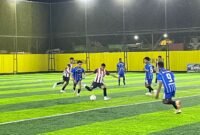 SMK Hermon melakoni SMA Negeri 6 dalam laga lanjutan Kapolda Cup II Mini Soccer 2026 tingkat SMA se-kabupaten Mimika pada Sabtu (16/5/2026) malam di Goldstone Arena, Timika. (Foto: Galeri Papua/Endy Langobelen)
