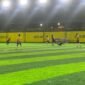 Pertandingan SMK Amamapare melawan SMA YPPGI dalam babak penyisihan grup terakhir Turnamen Minisoccer Kapolda Cup II di Goldstone Arena, Minggu (17/5/2026). (Foto: Galeri Papua/Ahmad)