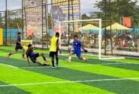 Pertandingan antara SMAN 3 Kokonao melawan SMK Harapan dalam babak semifinal Kapolda Cup II Mini Soccer di Goldstone Arena, Jalan Irigasi, Timika, Rabu (20/5/2026) sore. (Foto: Galeri Papua/Endy Langobelen)