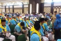 Ratusan jemaah haji Kloter UPG-27 bersiap menuju Tanah Suci di Asrama Haji Embarkasi Makassar, Minggu, 10 Mei 2026. Galeripapua/Istimewa