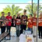 Foto bersama BRIN, BRIDA Mimika, dan Tifa Creative. (Foto: Galeri Papua/Endy Langobelen)