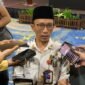 Kepala Disdukcapil Kabupaten Mimika, Slamet Sutejo saat diwawancarai di Ballroom Hotel Horison Ultima Timika, Kamis (18/6/2026). (Foto: Galeri Papua/Ahmad)