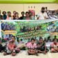 Foto bersama usai kegiatan nonton bareng dan diskusi film yang diselenggarakan LEPEMAWIL-MIMTIM di Kampung Naena Muktipura, Sabtu (8/8/2026). (Foto: Galeri Papua/Endy Langobelen)