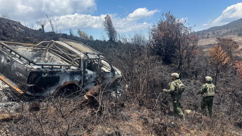 Aparat militer dari Koops TNI Habema menemukan jenazah Aris Sanda alias Bapak Tasya, pengemudi kendaraan lajur­an yang menjadi korban kekerasan kelompok bersenjata, dalam kondisi terbakar bersama sebuah mobil di kawasan sekitar Danau Habema, Gunung Boy, Distrik Trikora, Kabupaten Jayawijaya, Papua Pegunungan. (Foto: Koops TNI Habema)