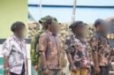 Empat anggota kelompok bersenjata OPM mengikuti Upacara Reintegrasi Nasional di halaman Makodim 1714/Puncak Jaya, Sabtu (26/9/2026). (Foto: Koops TNI Habema)